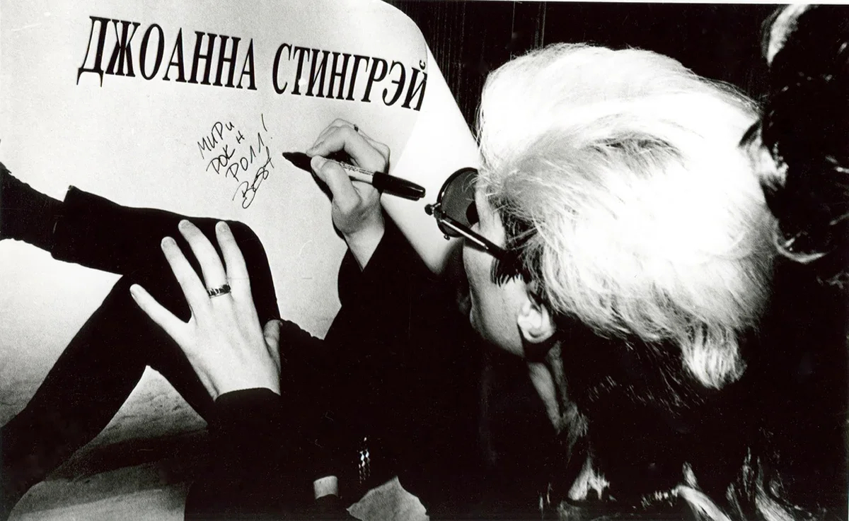 Joanna Stingray signs an autograph, 1990s. Photo: Joanna Stingray