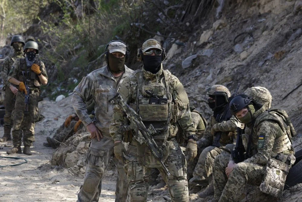 Members of the Siberian Battalion attend their military training on a shooting range near Kyiv, Ukraine, 10 April 2024. Photo: EPA-EFE/SERGEY DOLZHENKO