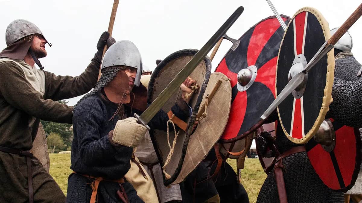 Participants prepare for the annual re-enactment of the Battle of Hastings, which in 1066 ended Anglo-Saxon dominance in England, at Battle Abbey, East Sussex, 15 October 2016. Photo: EPA / Will Oliver