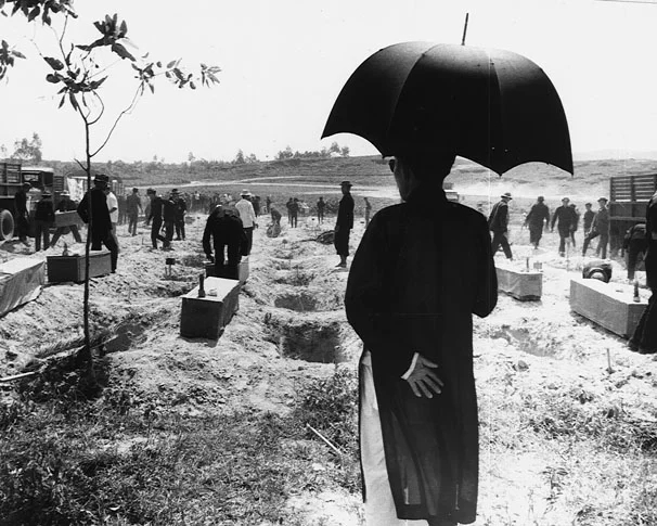 Interment for 300 unidentified victims of communist occupation of Hue in 1968. Photo by United States Army