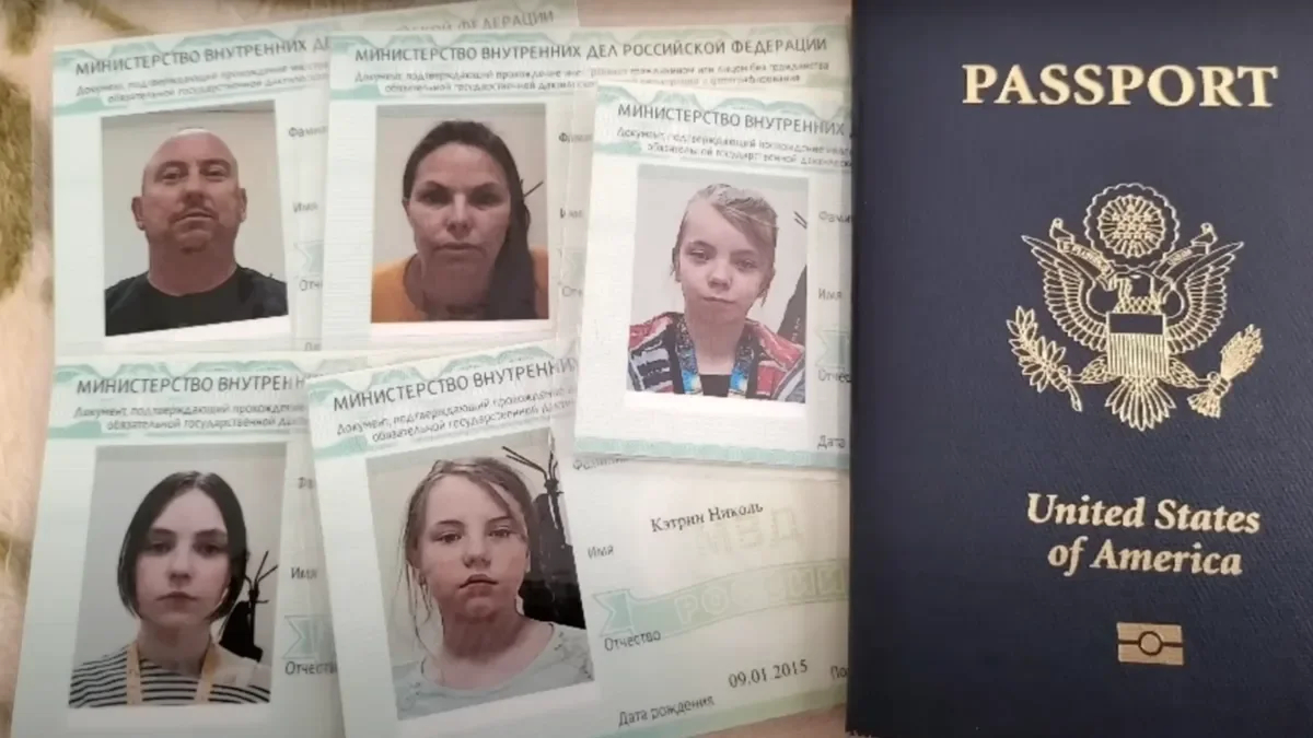 The Huffman family’s ID cards issued by the Russian Interior Ministry. Source: YouTube / Huffman Time
