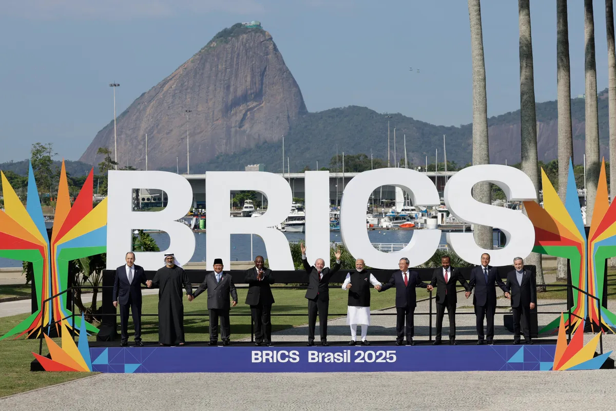 Russian Foreign Minister Sergey Lavrov (L) at the opening ceremony of the BRICS summit in Rio de Janeiro, Brazil, alongside representatives of the organisation’s nine other member states, 6 July 2025. Photo: EPA / ANDRE COELHO